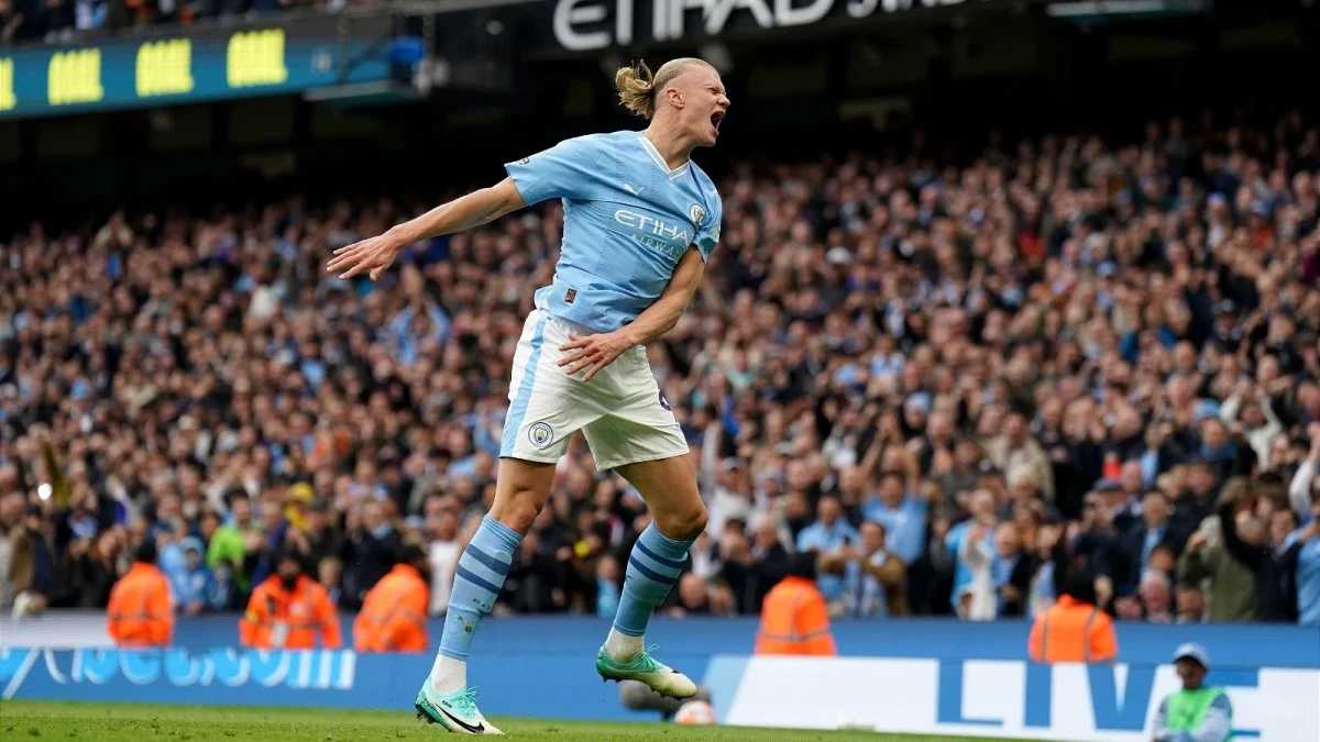 Erling Haaland celebrates scoring for Man City