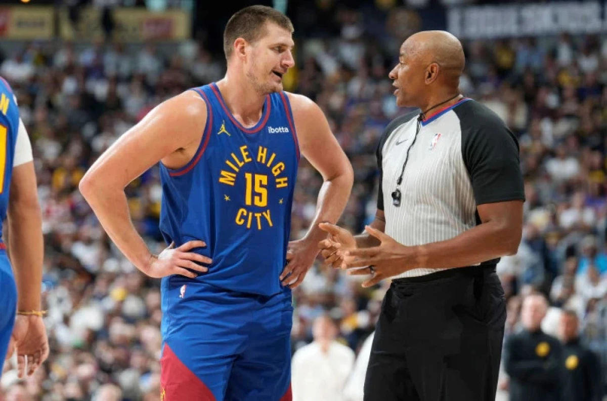 Denver Nuggets center Nikola Jokic, left, argues after he was called for a foul against the Los Angeles Lakers - Oct 2023