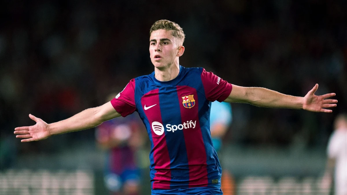 Fermin Lopez of Barcelona celebrates scoring