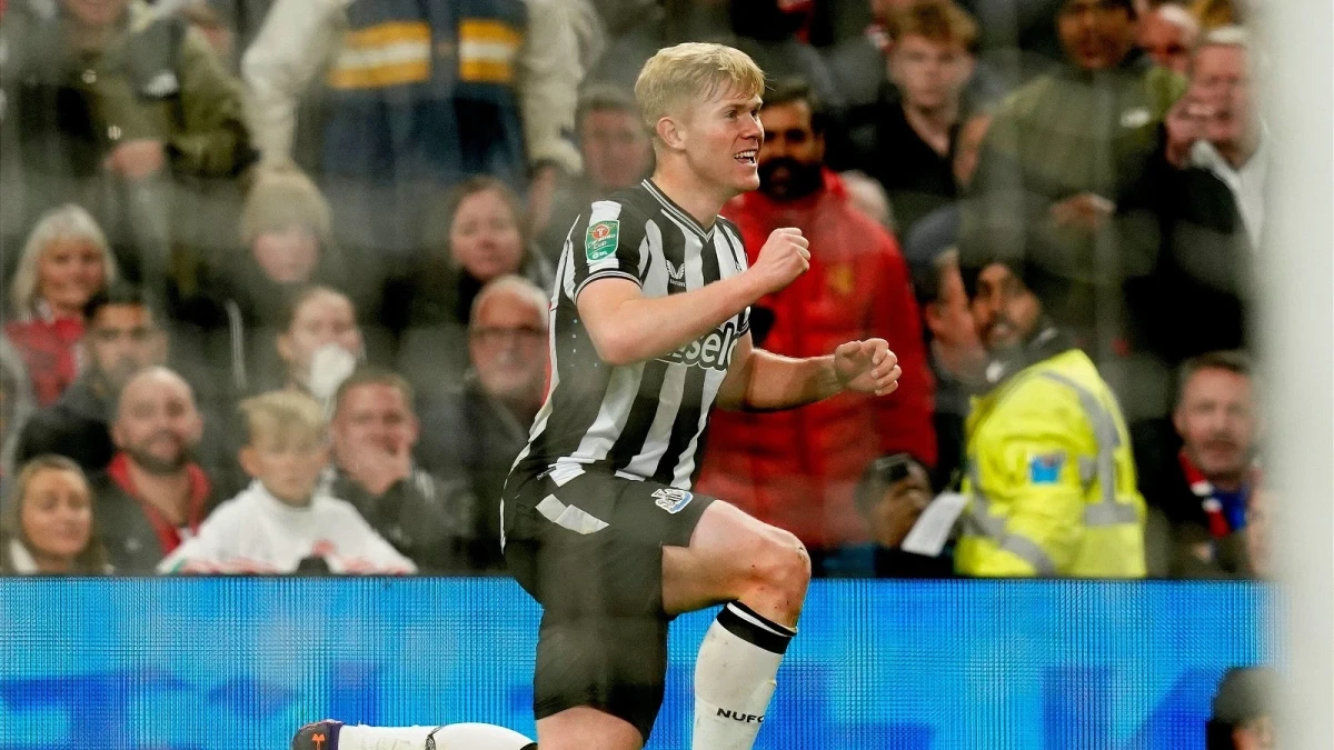Lewis Hall of Newcastle United celebrates scoring