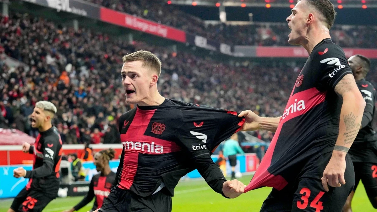 Florian Wirtz of Bayer Leverkusen celebrates scoring