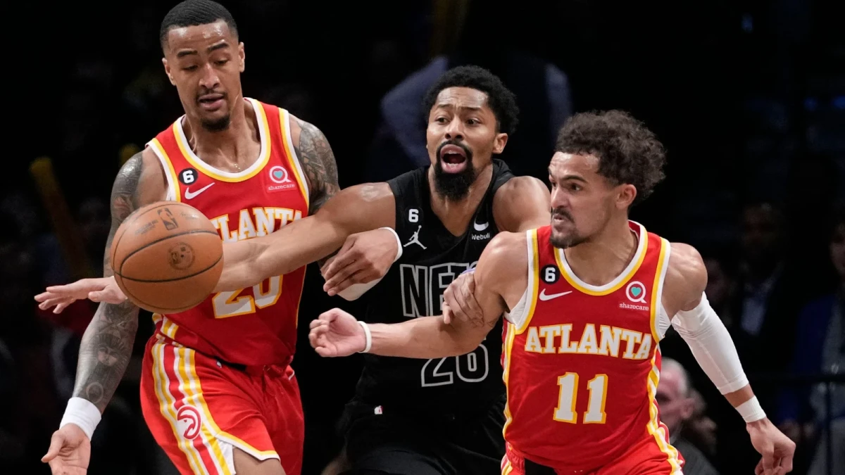 John Collins, Spencer Dinwiddie and Trae Young