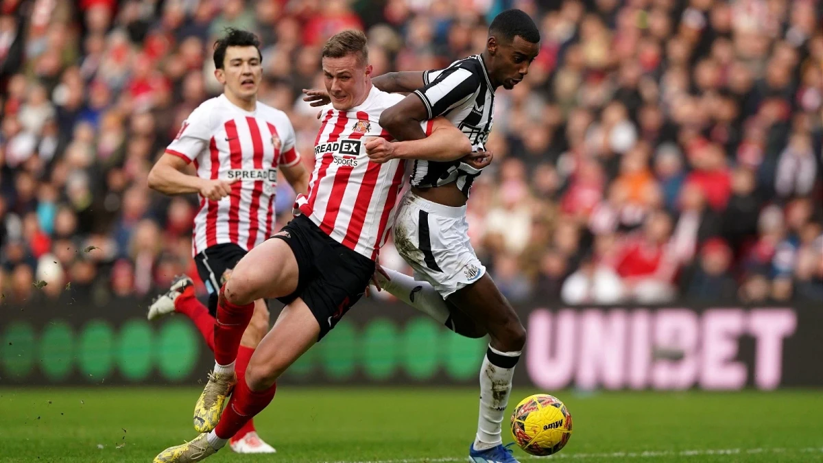 Sunderland's Daniel Ballard and Newcastle United's Alexander Isak