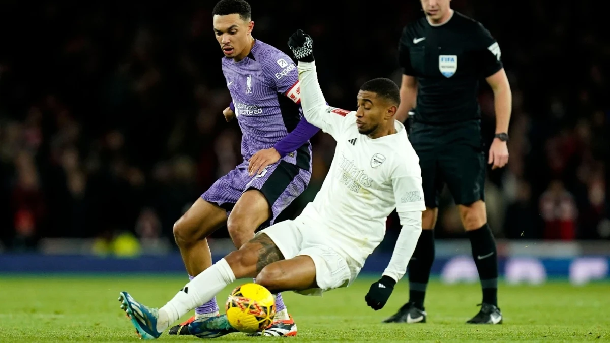 Liverpool's Trent Alexander-Arnold and Arsenal's Reiss Nelson