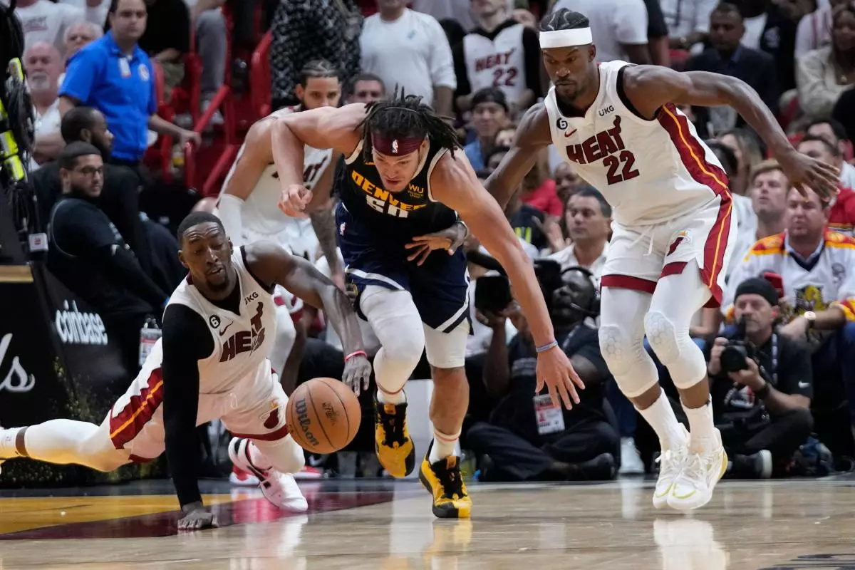 Aaron Gordon and Jimmy Butler in Game Four of the NBA Finals June 9, 2023