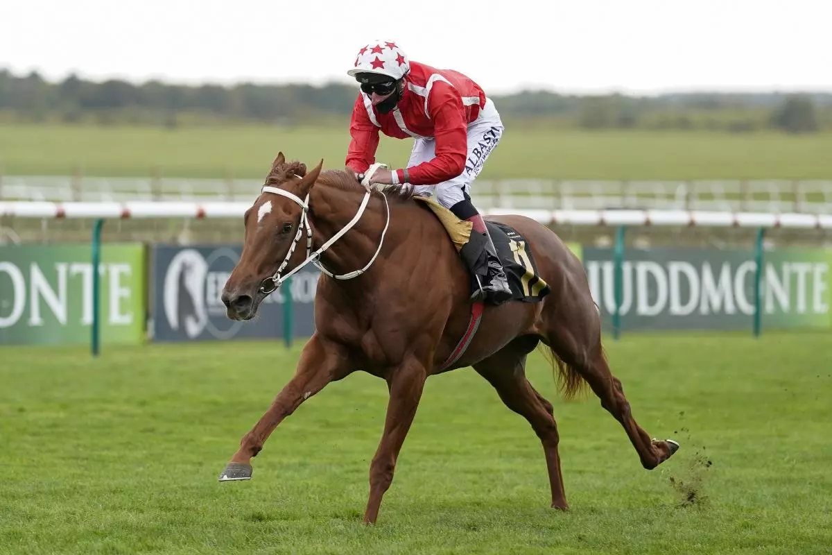 Adam Kirby riding Saffron Beach wins The Blandford Bloodstock Maiden Fillies' Stakes