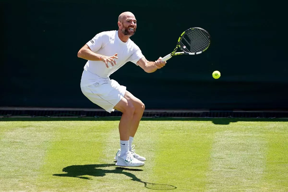Adrian Mannarino in action at Wimbledon in 2023
