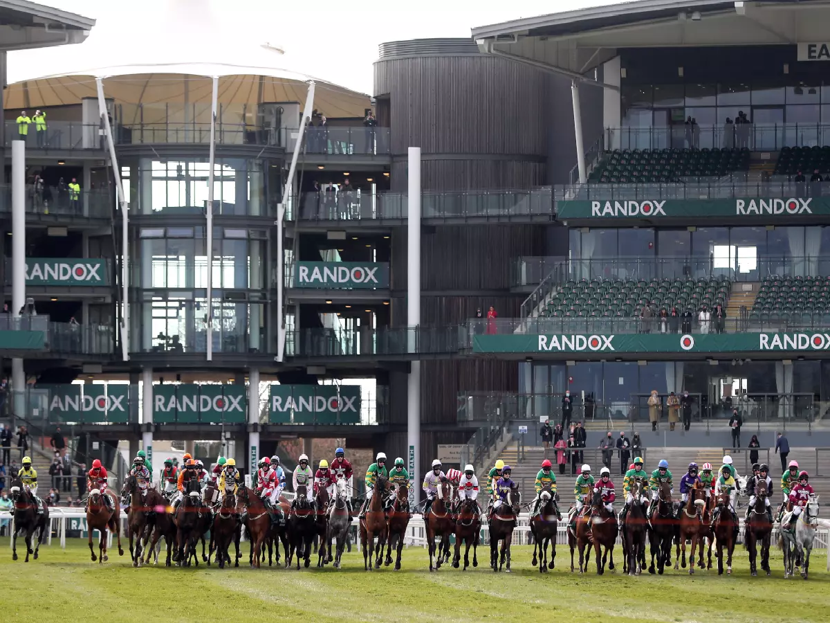 Runner and riders line up for the start of the Randox Grand National Handicap Chase during Grand National Day of the 2021 Randox Health Grand National Festival at Aintree Racecourse, April 10