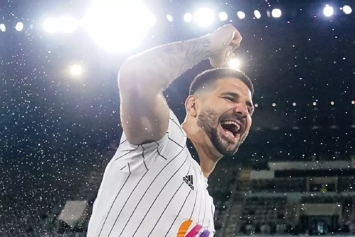 Aleksandar Mitrovic celebrates promotion to the Premier League with Fulham