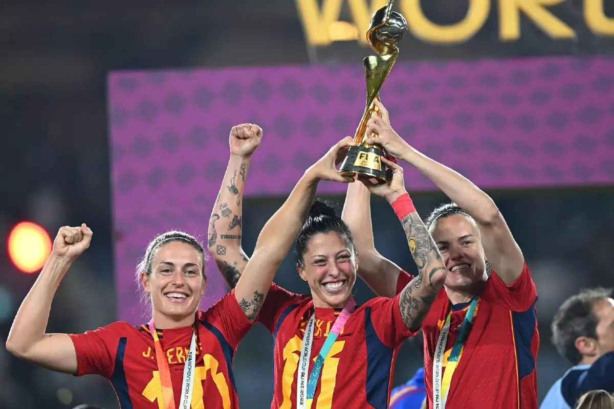 Alexia Putellas, Jennifer Hermoso and Irene Paredes of Spain celebrate with the winners' trophy during FIFA Women's World Cup 2023 Final