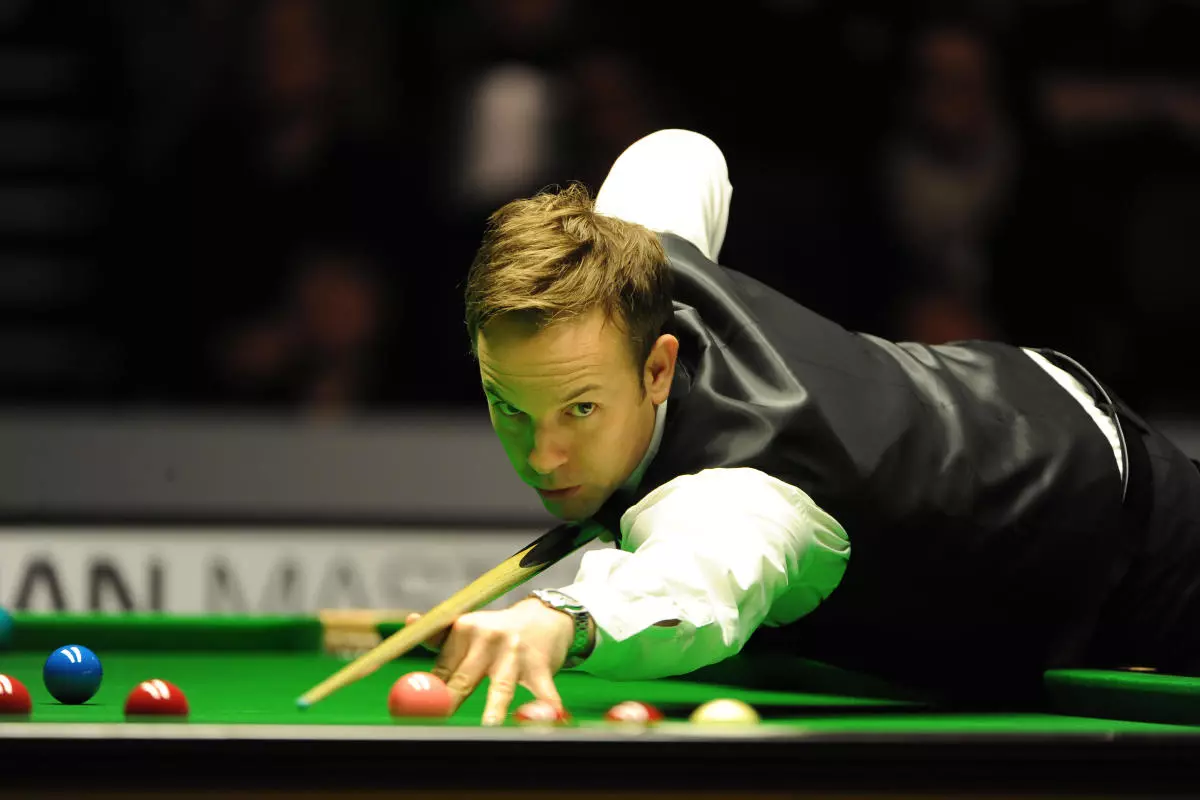 Ali Carter plays in the Snooker finale of the German Masters