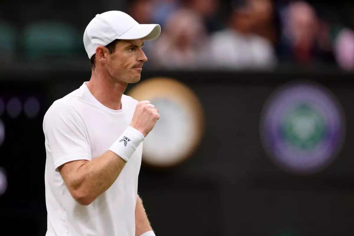 Andy Murray celebrates as he wins the match against Ryan Peniston - July 2023