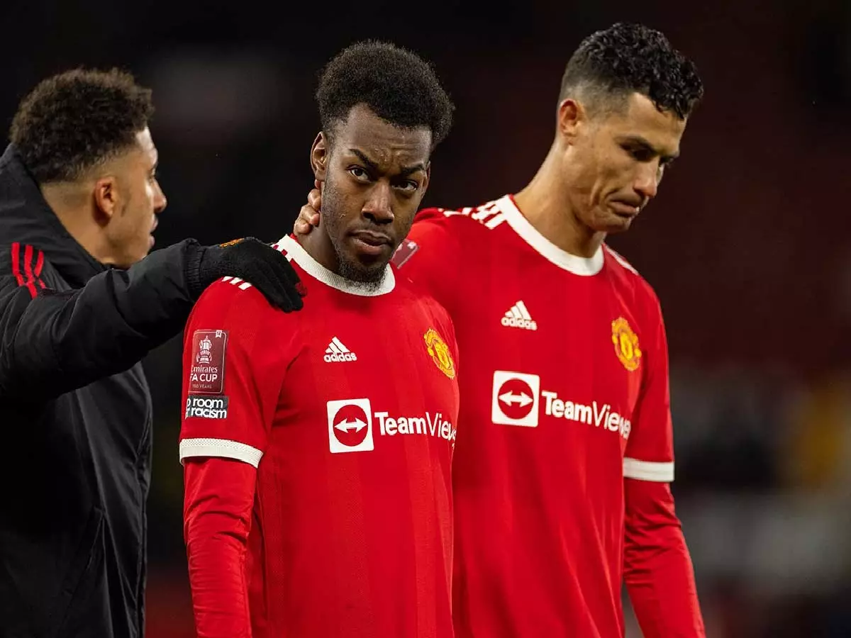 Cristiano Ronaldo consoles Anthony Elanga