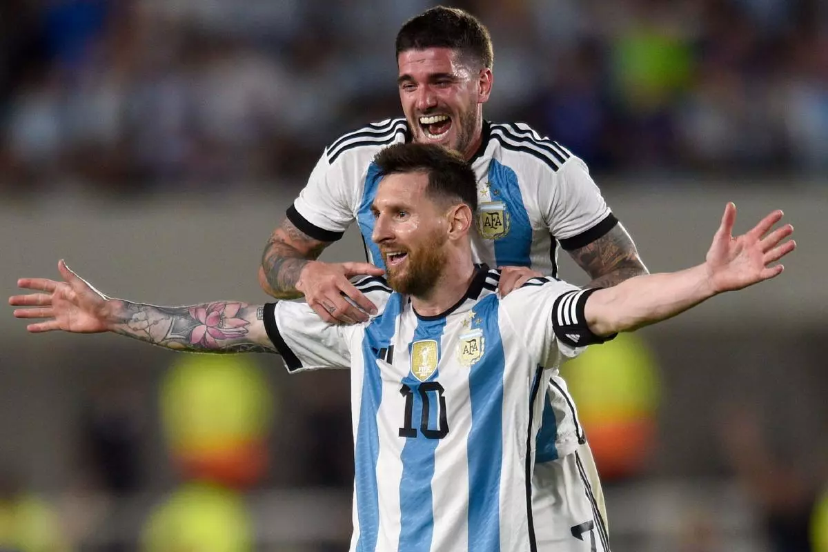 Argentina's Lionel Messi celebrates his 800th goal with teammate Rodrigo De Paul
