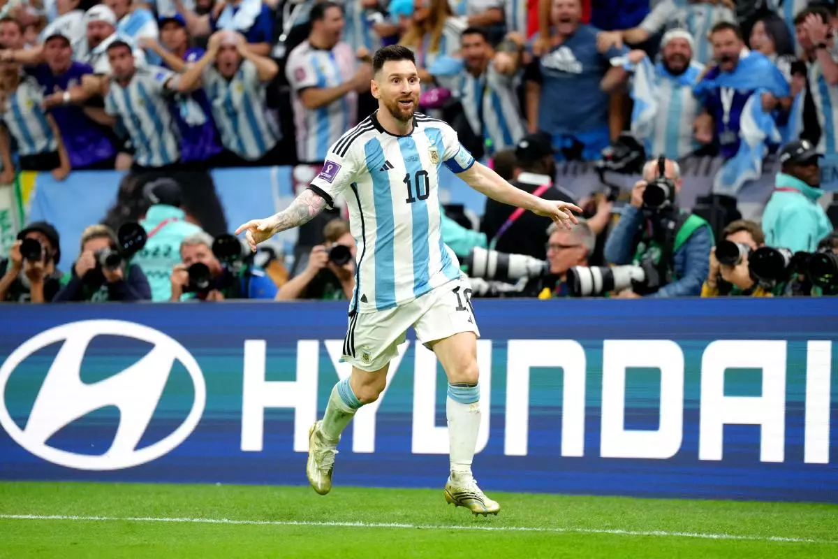Argentina's Lionel Messi celebrates scoring their side's third goal