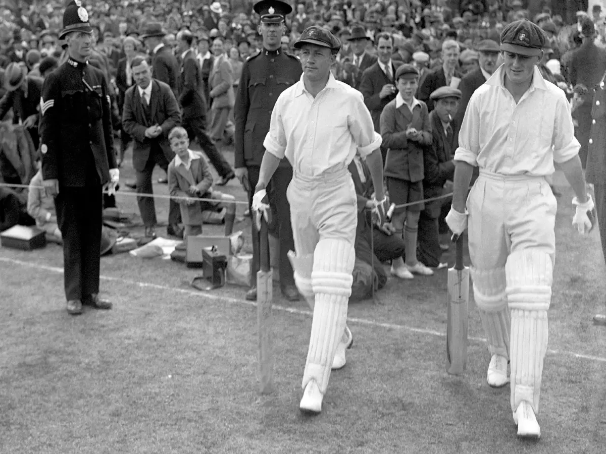 Australia's Don Bradman and Stan McCabe make their way to the wicket