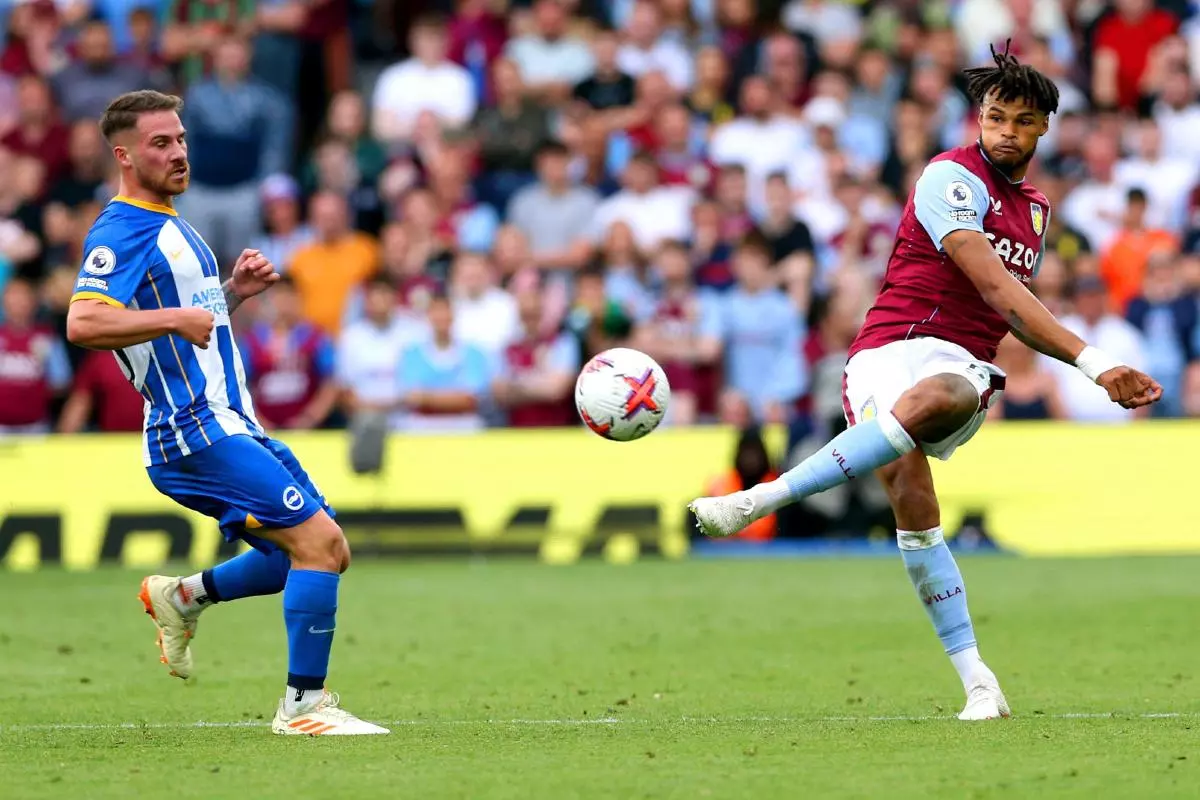 Aston Villa's Tyrone Mings (right) and Brighton and Hove Albion's Alexis Mac Allister