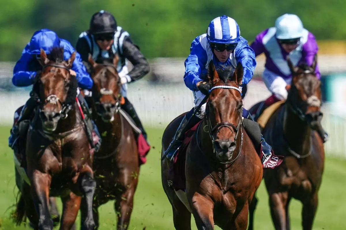 Baaeed ridden by Jim Crowley on their way to victory in the Al Shaqab Lockinge Stakes at Newbury