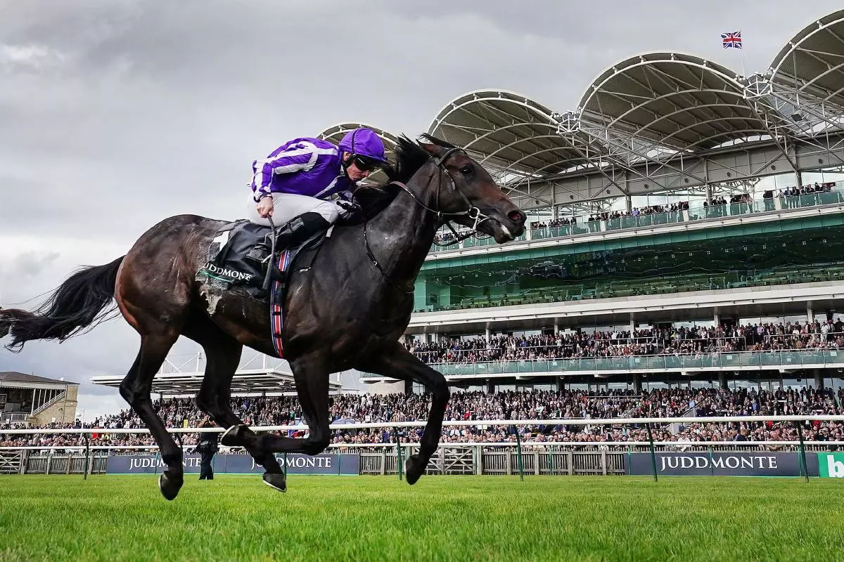 Blackbeard ridden by jockey Ryan Moore winning the Juddmonte Middle Park Stakes at Newmarket racecourse