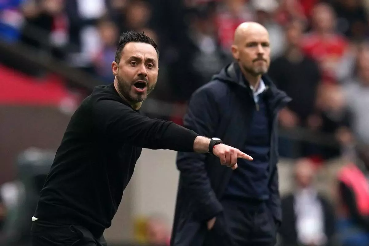 Brighton and Hove Albion manager Roberto De Zerbi and Manchester United manager Erik ten Hag