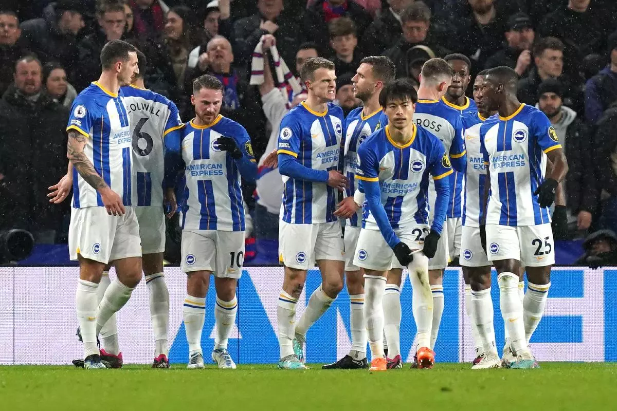 Brighton and Hove Albion's Solly March (centre) celebrates scoring