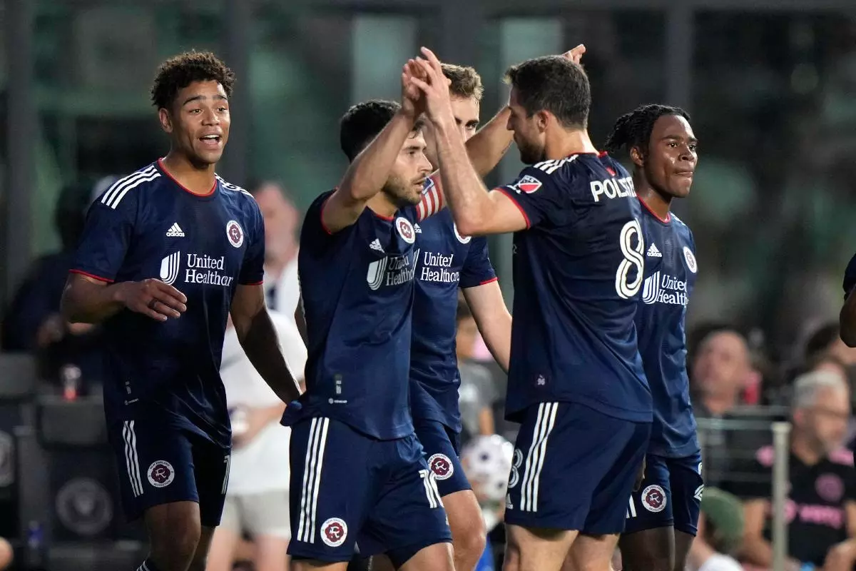 Carles Gil and New England Revolution celebrate an MLS goal May 13, 2023