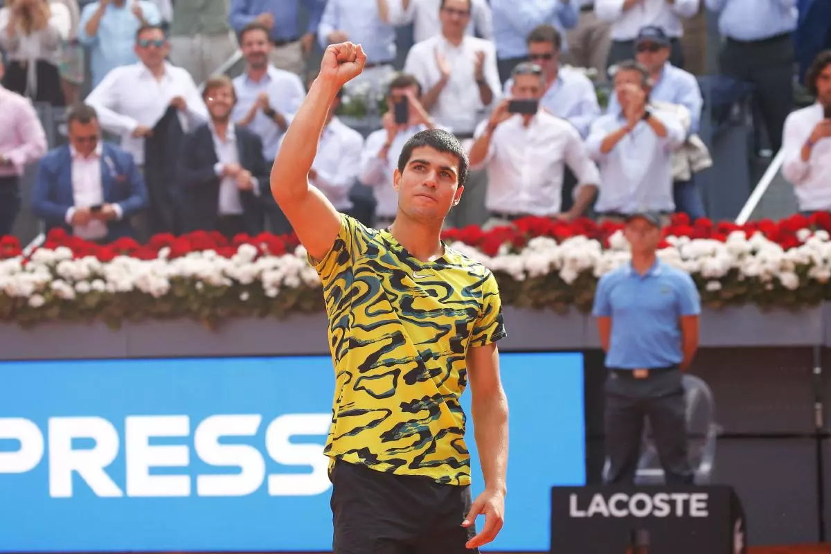 Carlos Alcaraz celebrate after winning singles quarter-finals match against Karen Kachanov at the Madrid Open - May 2023