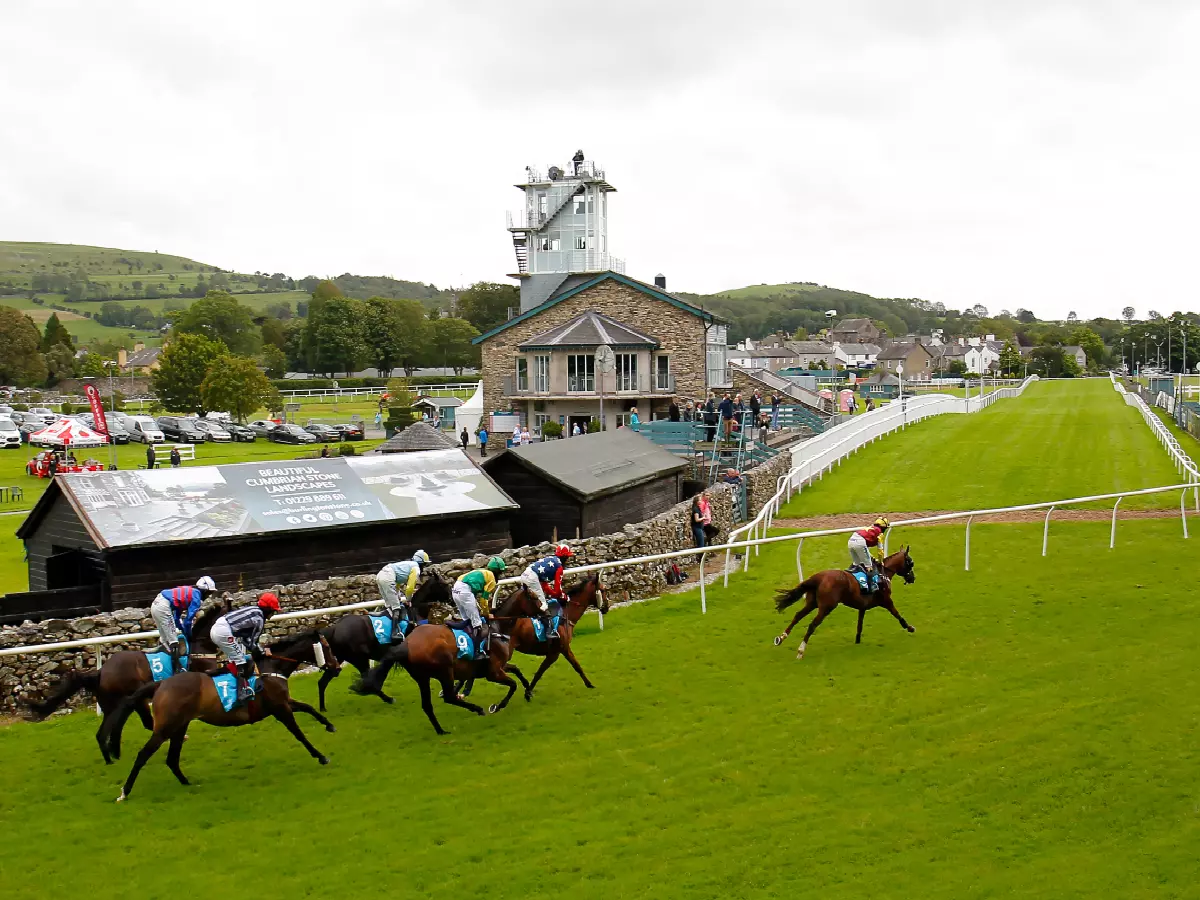 Runners and riders race round Cartmel racecourse, June 26, 2020