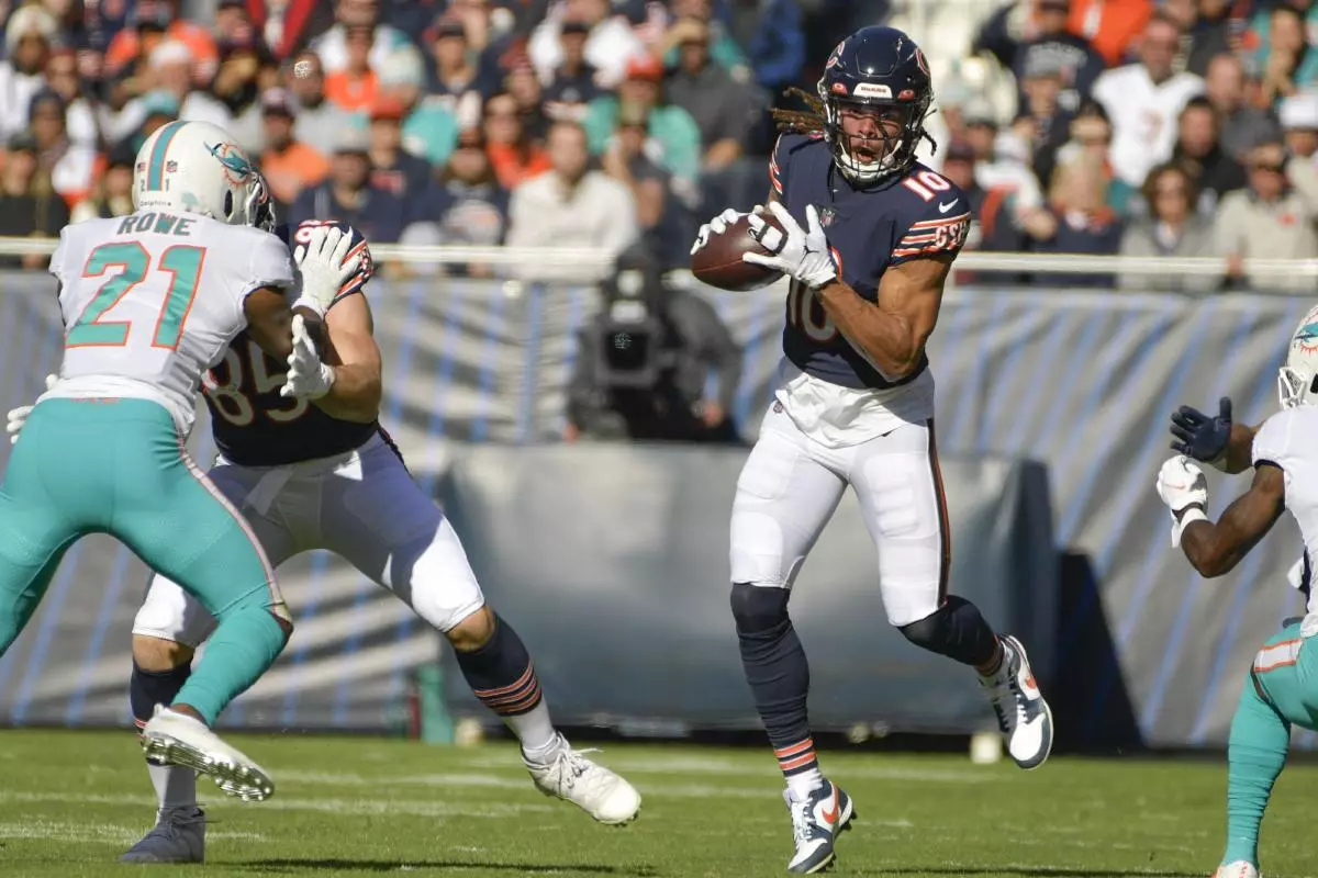 Chicago Bears wide receiver Chase Claypool (10) completes the pass against the Miami Dolphins - April 2023