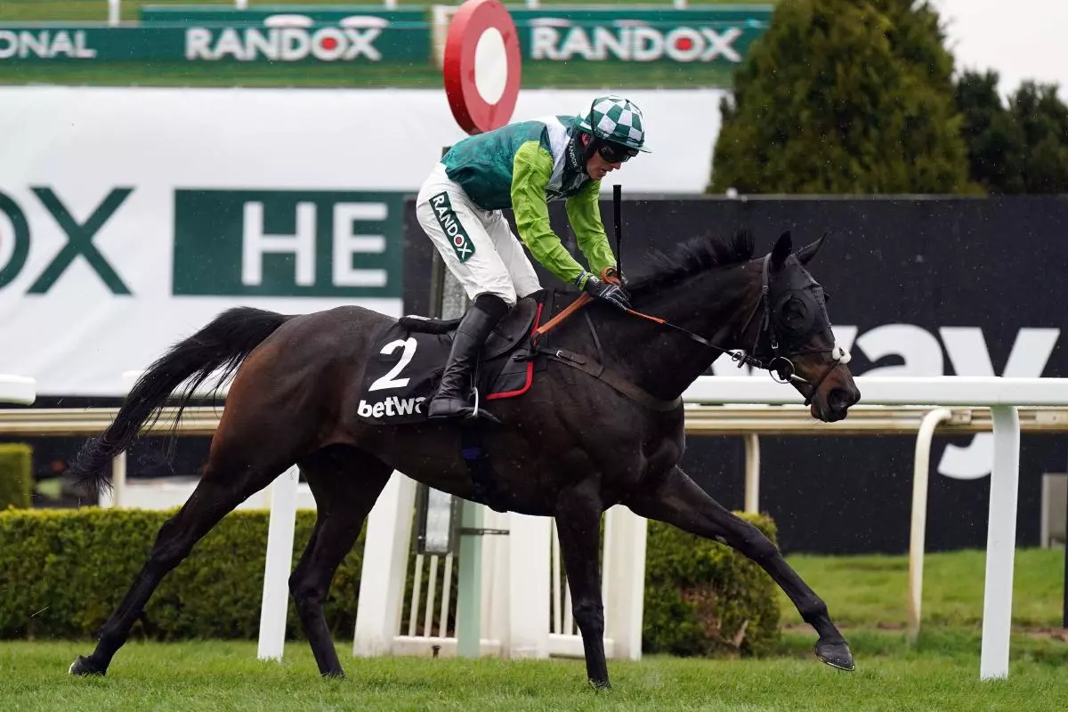 Clan Des Obeaux ridden by Harry Cobden on their way to winning the Betway Bowl Chase