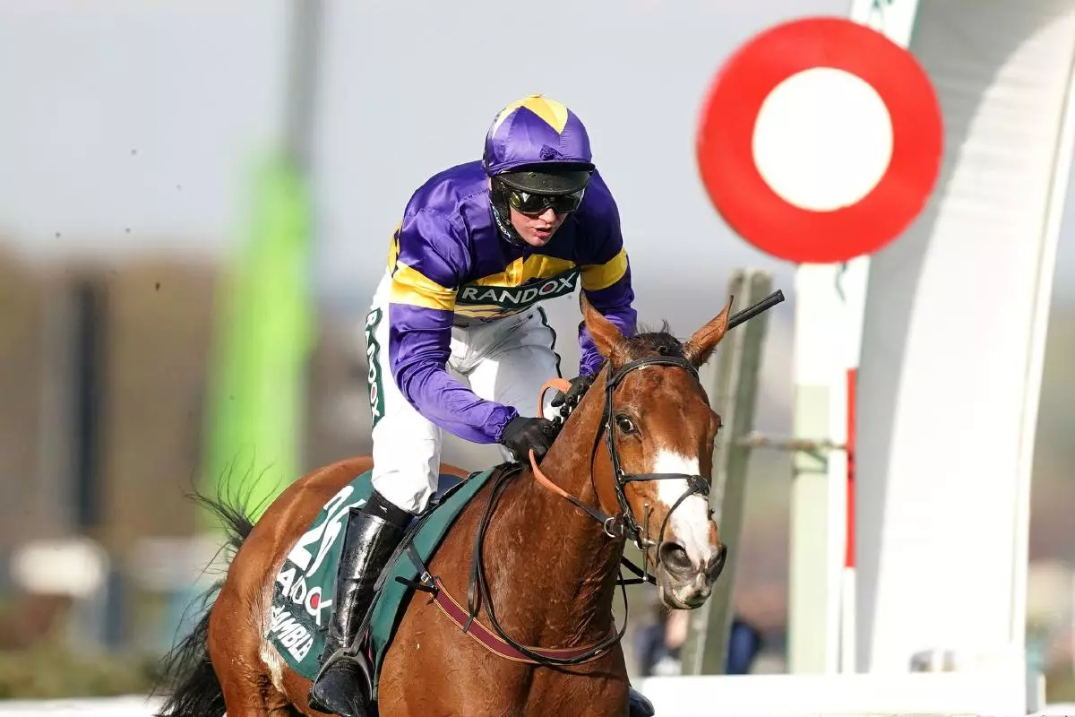 Corach Rambler ridden by Derek Fox on their way to winning the Randox Grand National Handicap Chase