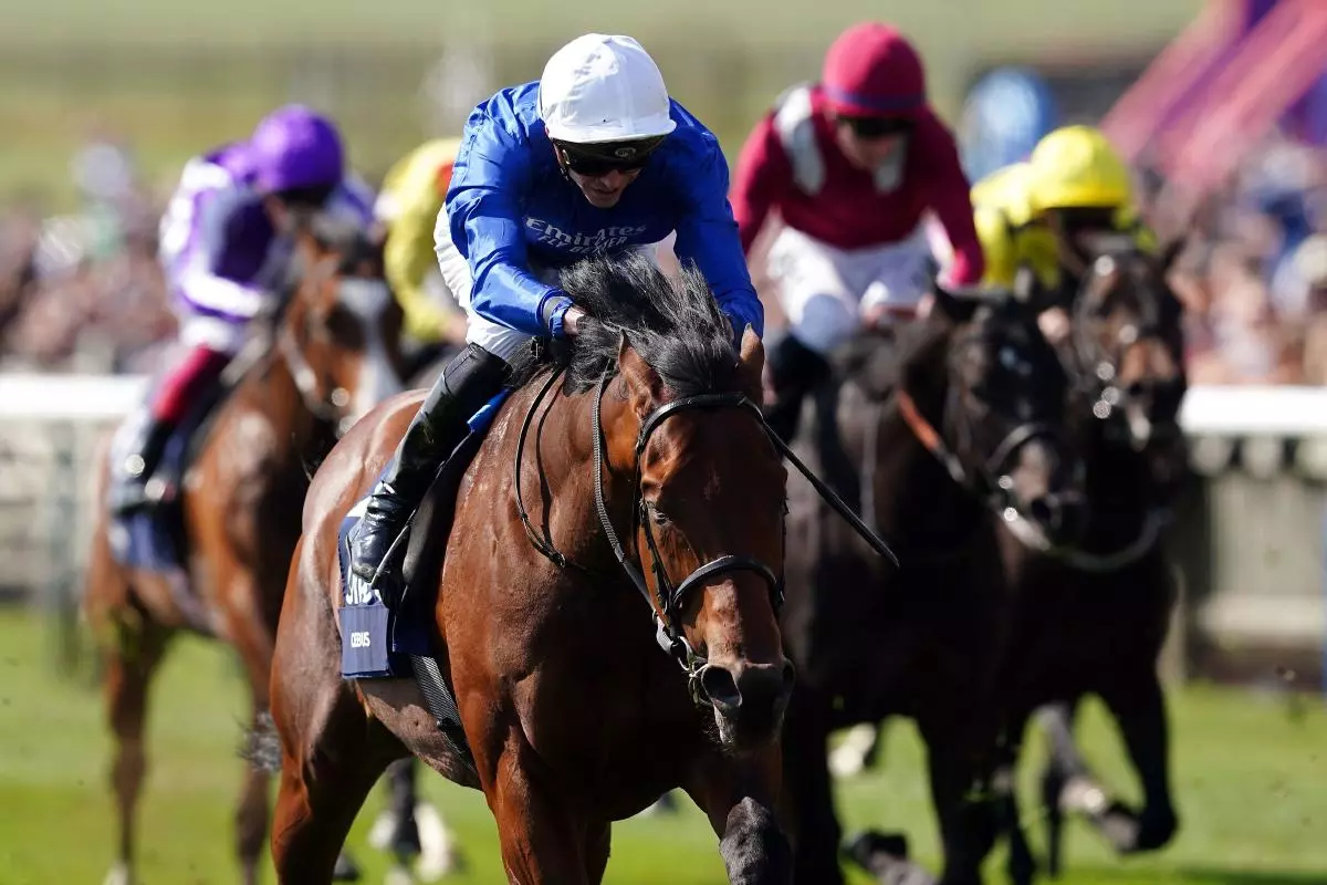 Coroebus ridden by jockey James Doyle on their way to winning the Qipco 2000 Guineas Stakes