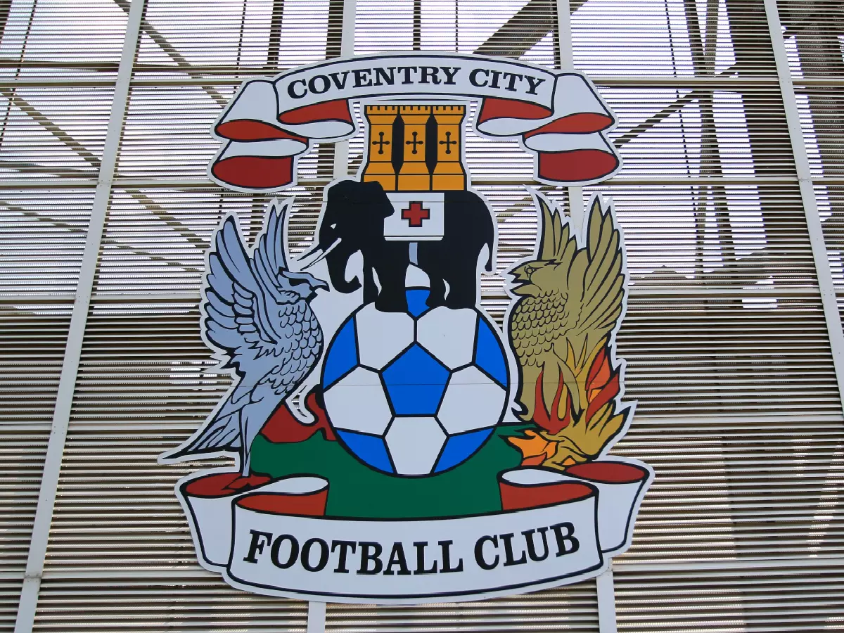 Coventry City badge on the outside of the stadium