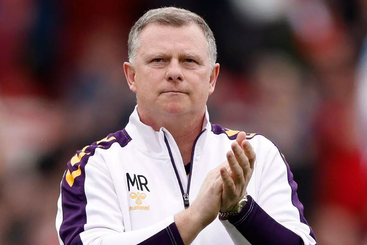 Coventry City manager Mark Robins celebrates