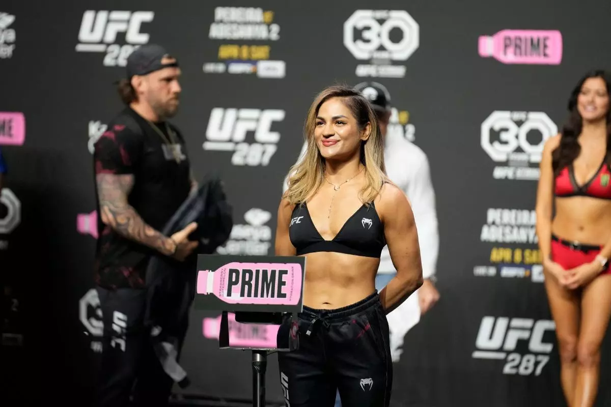 Cynthia Calvillo steps on the scale at the ceremonial weigh-ins at UFC287 - April 2023