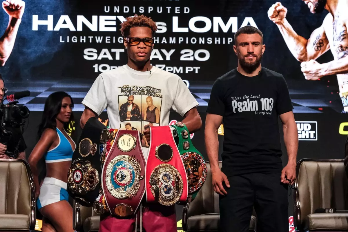 Devin Haney and Vasyl Lomachenko face off at the final press conference