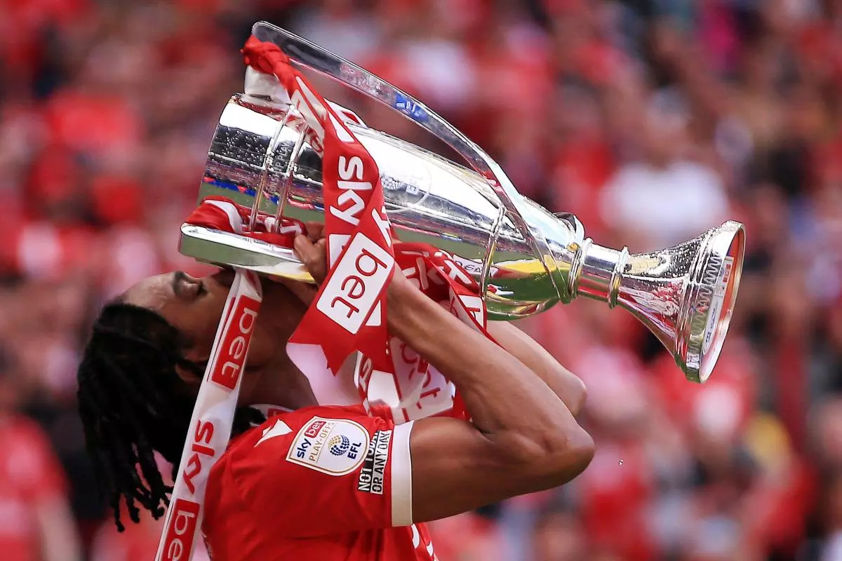 Djed Spence of Nottingham Forest celebrates promotion to the Premier League - May 2022