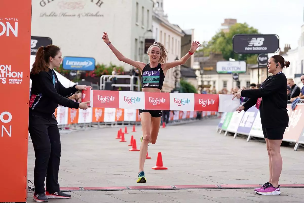 Eilish McColgan celebrates winning the Big Half, which runs from Tower Bridge to Greenwich, London