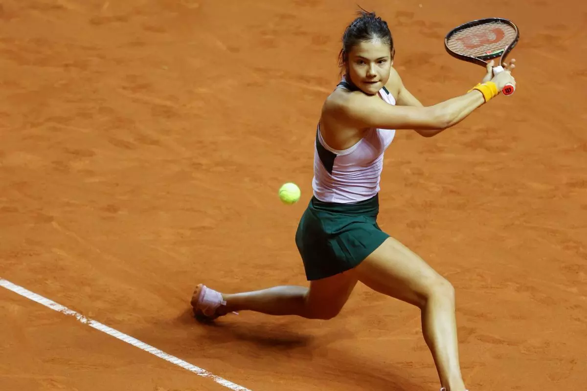 Emma Raducanu in action at the Porsche Tennis Grand Prix 2022