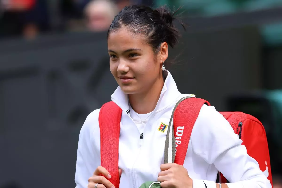 Emma Raducanu walks out onto centre court for her match