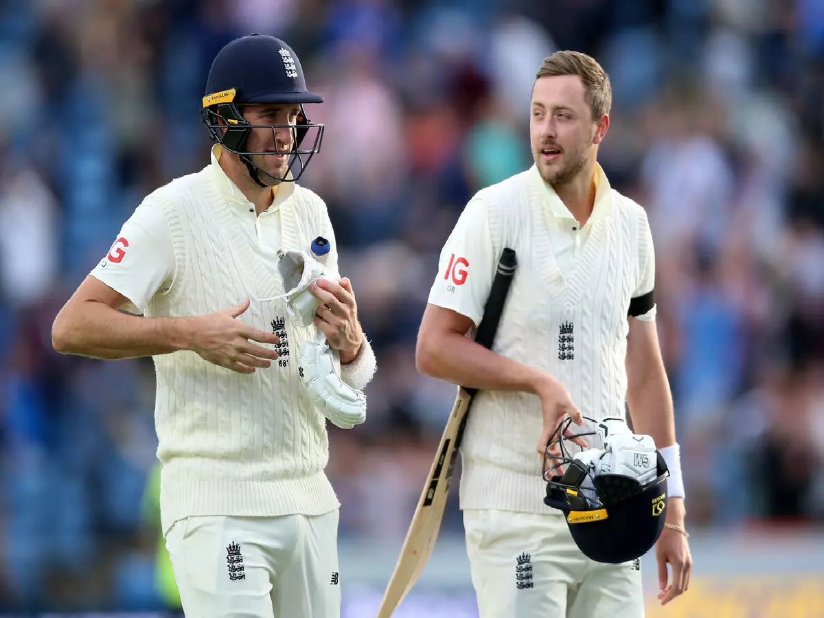 England's Craig Overton and Ollie Robinson