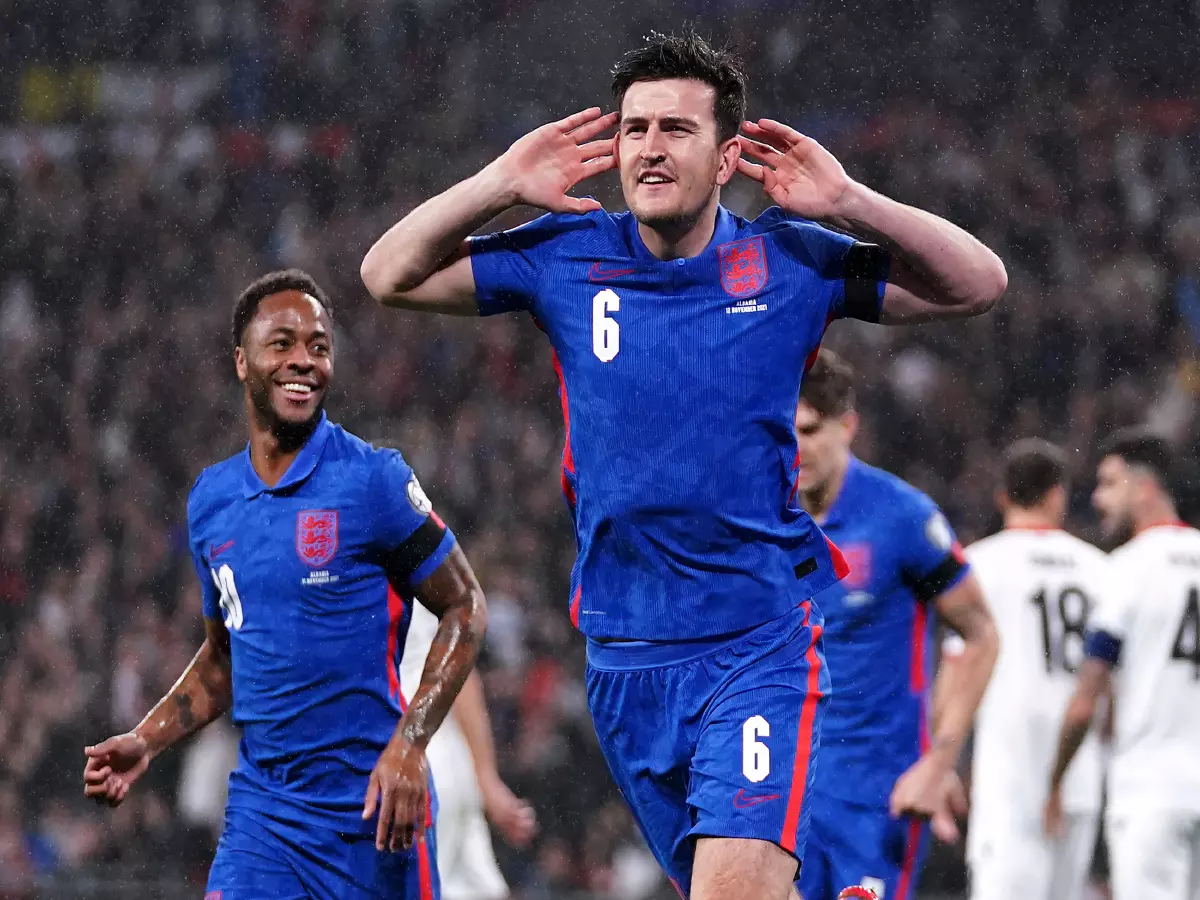England's Harry Maguire celebrates scoring their side's first goal of the game during the FIFA World Cup Qualifying match at Wembley Stadium, London. Picture date: Friday November 12, 2021.
