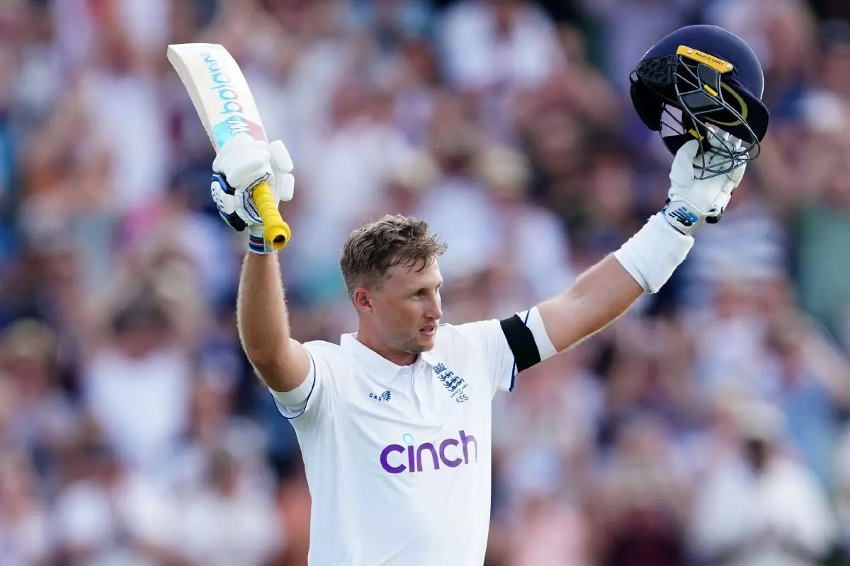 England's Joe Root celebrates reaching his century in first Ashes Test