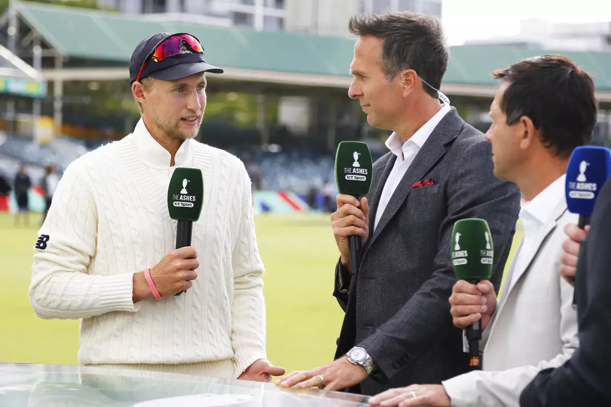 England's Joe Root talks to Michael Vaughan during day five of the Ashes Test match at the WACA Ground, Perth.