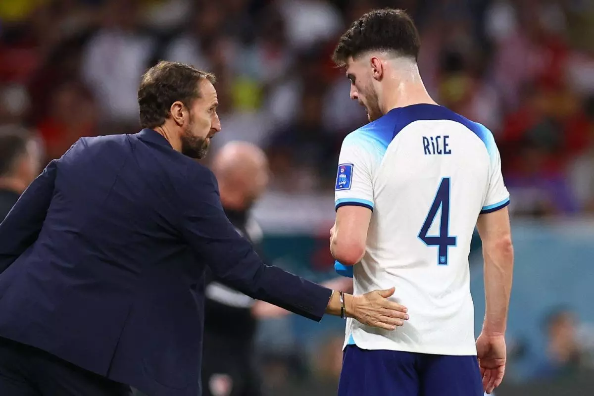 England manager Gareth Southgate and Declan Rice during a break in play