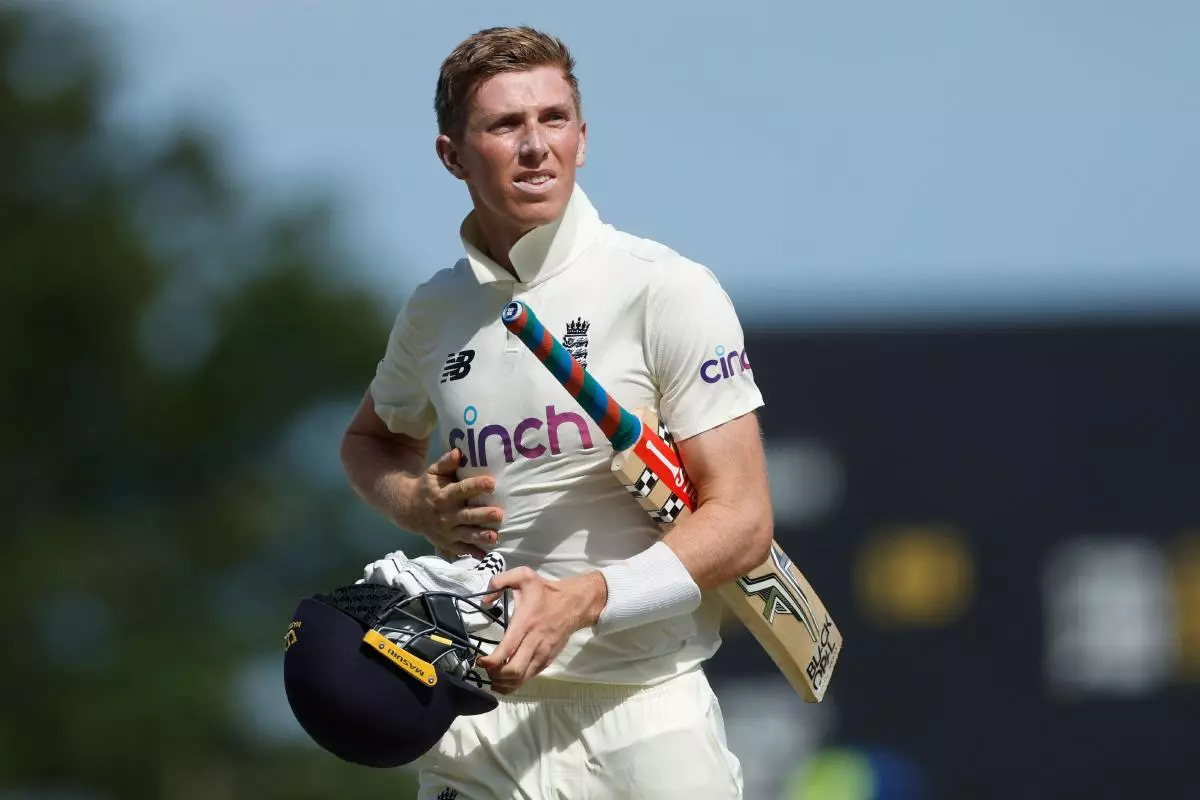 England's Zak Crawley reacts after being bowled out