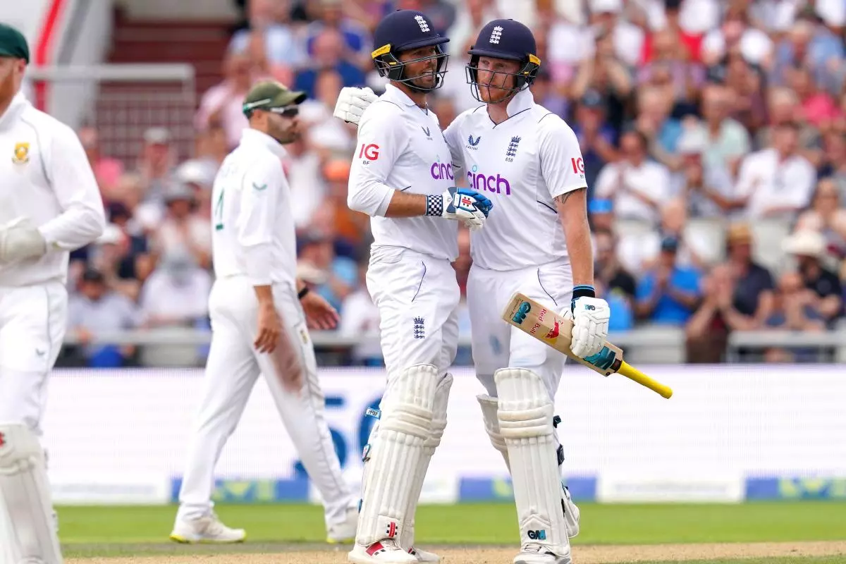 England's Ben Foakes (left) celebrates with team-mate Ben Stokes