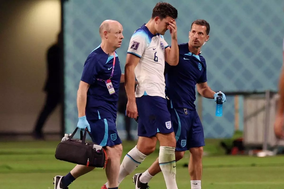 England's Harry Maguire is substituted after a concussion injury
