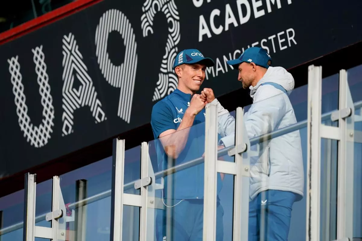 England's Zak Crawley and Joe Root on the balcony at the end of day two of the 4th Ashes Test - July 2023