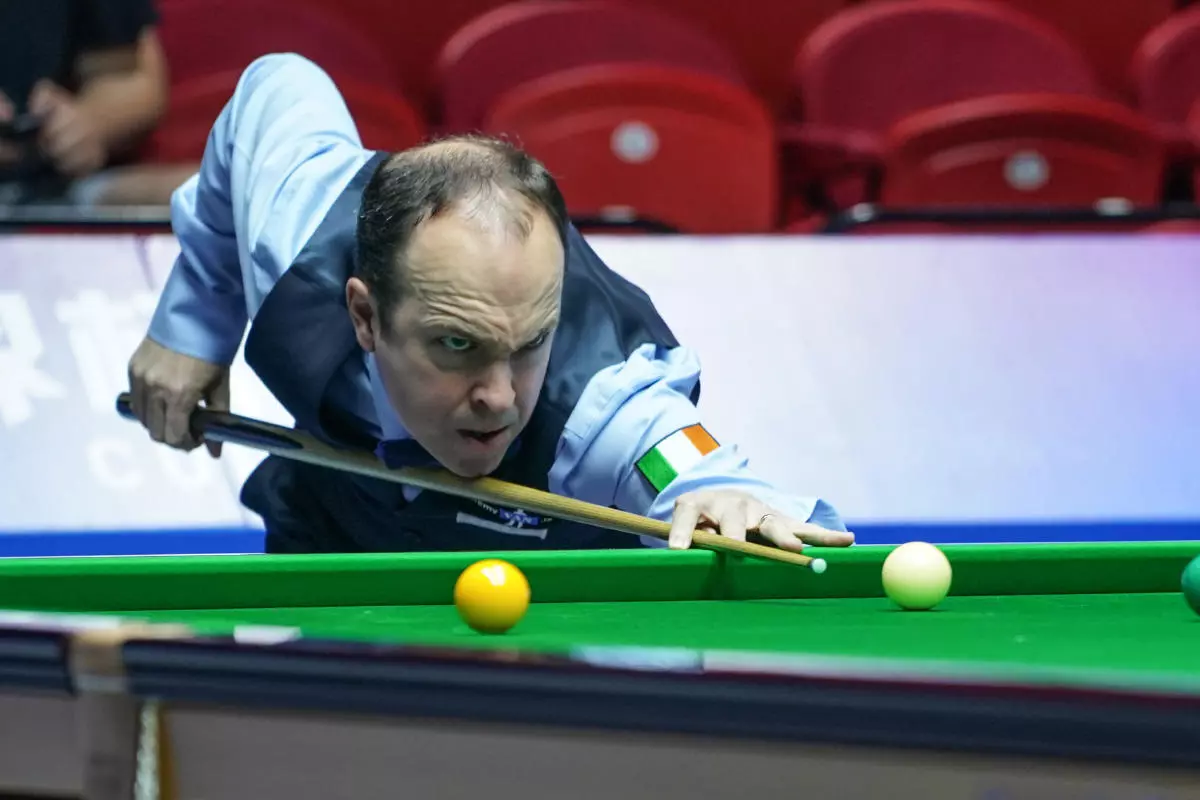 Fergal O'Brien competes during 2019 Snooker World Cup group stage match